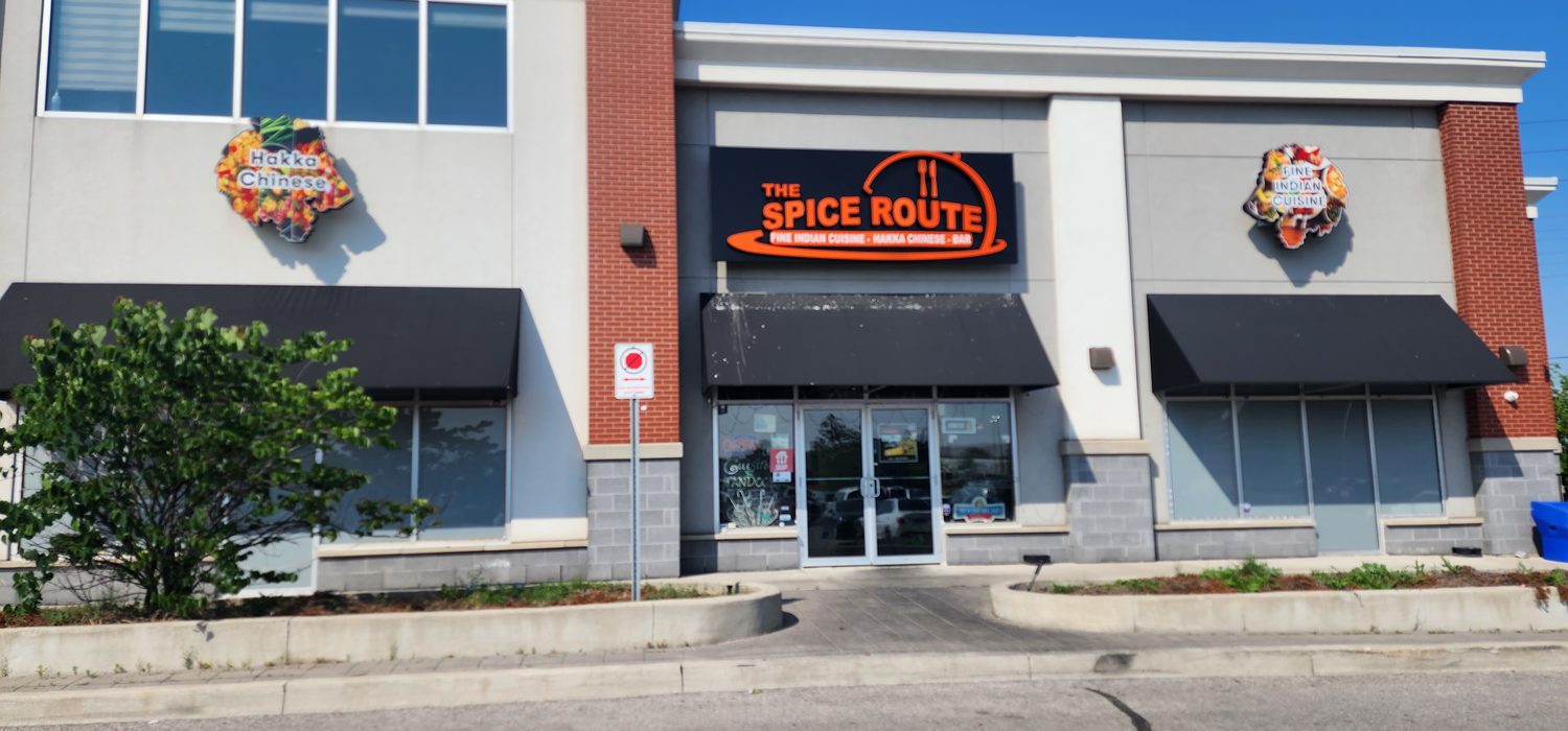 Restaurant storefront signage and awning
